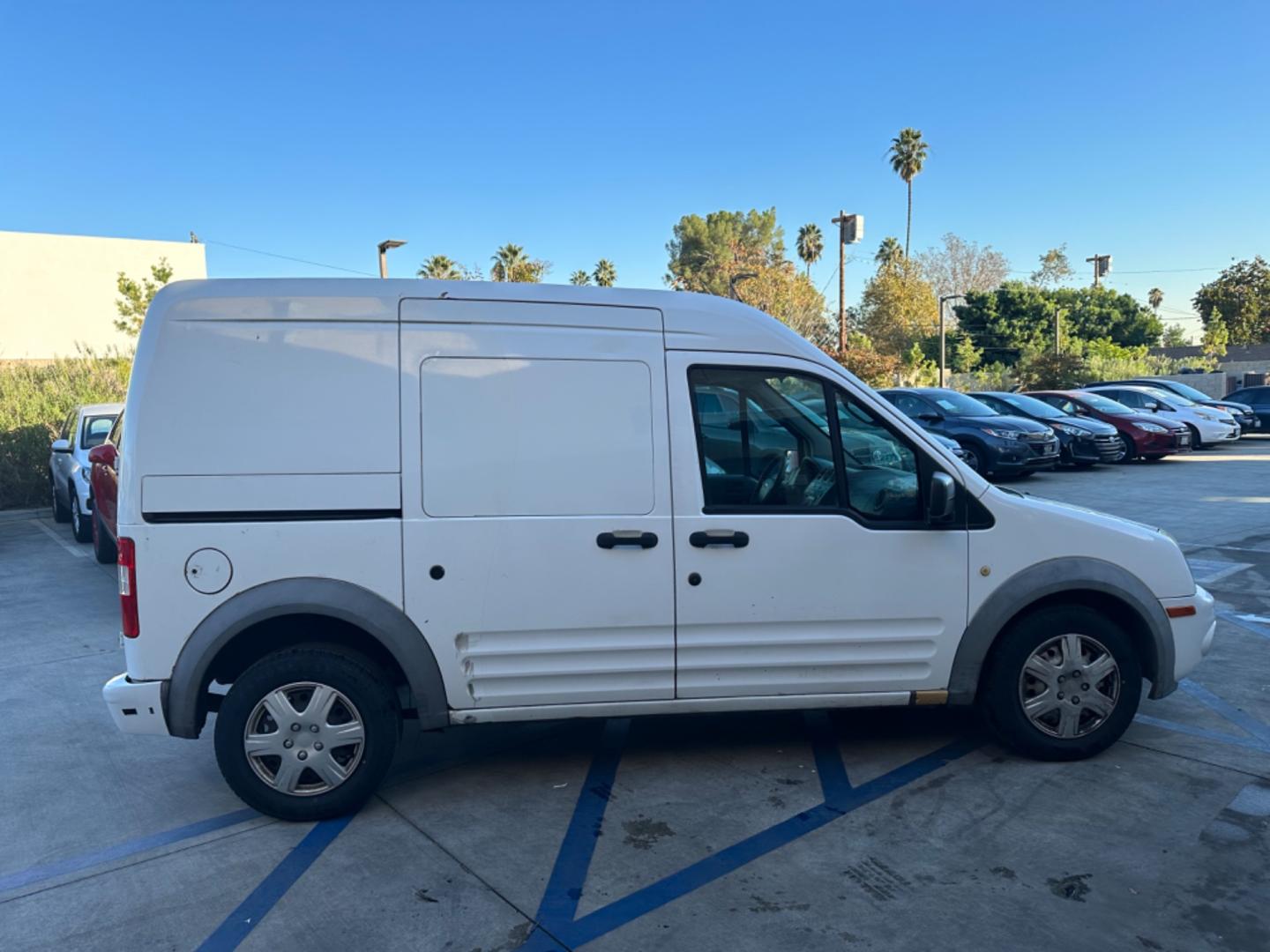 2012 White /Black Ford Transit Connect XLT with Rear Door Glass (NM0LS7BN0CT) with an 2.0L L4 DOHC 16V engine, 4-Speed Automatic transmission, located at 30 S. Berkeley Avenue, Pasadena, CA, 91107, (626) 248-7567, 34.145447, -118.109398 - Great price point for a work van. - Photo#5